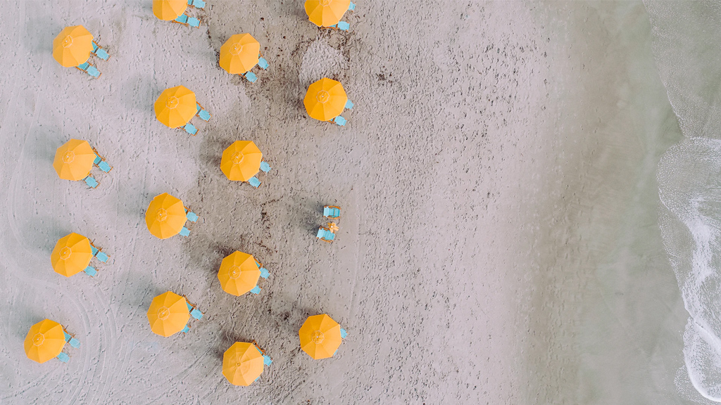 Yellow umbrellas on the beach