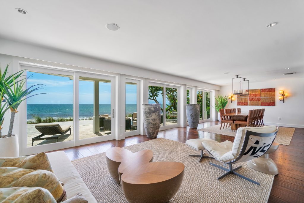 The living room at 6195 North Ocean Boulevard overlooks the Atlantic Ocean.