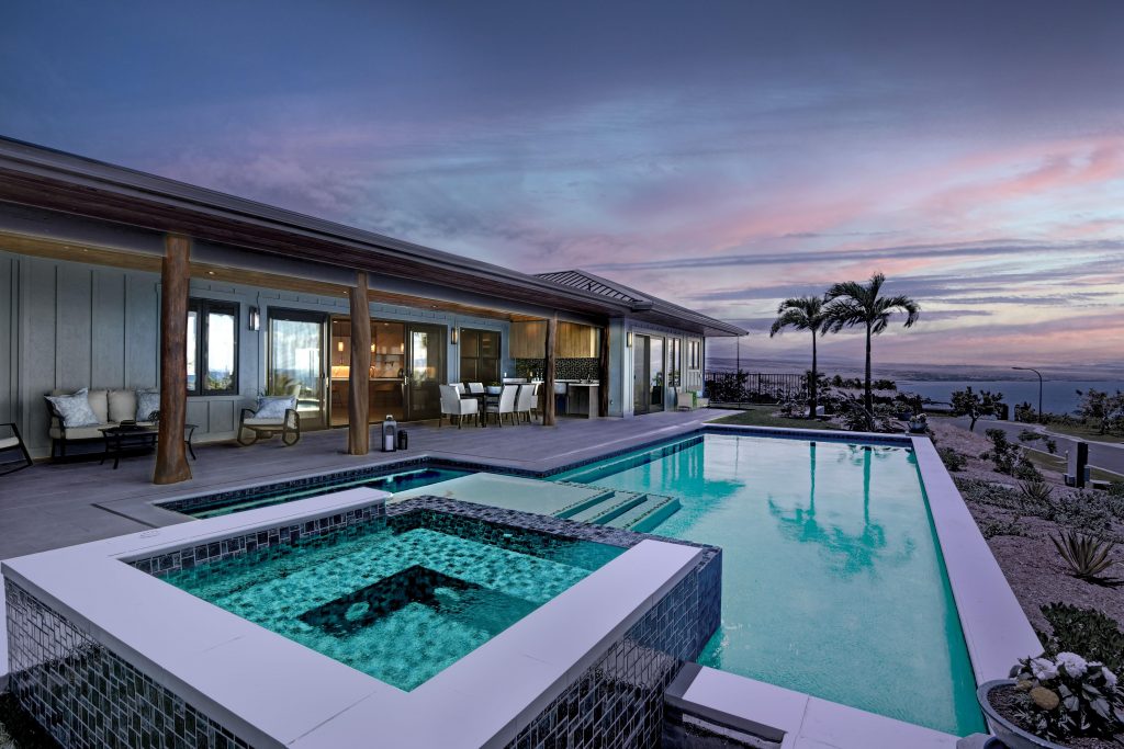 59-121 Kihi Kihi Place in Hawaii looks out over the Pacific Ocean from its swimming pool and spa.