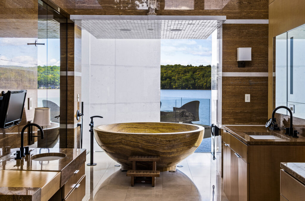 The bathtub at 46 Ledgerock Lane has a striking view overlooking the compound.