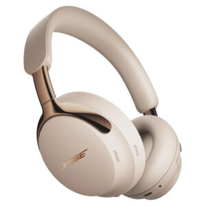 Beige over-ear Bose headphones with a sleek, modern design, perfect for holiday decorating sessions, featuring cushioned ear pads and headband, metallic accents, and built-in controls.